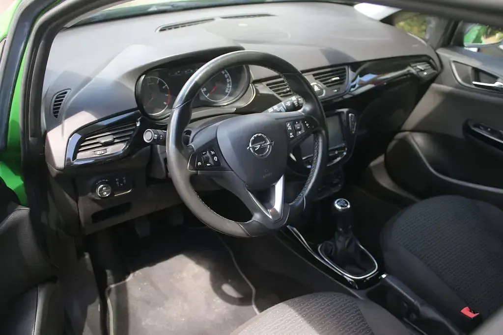 Gebraucht Opel Corsa drive 90 PS (66 kW) 2016 Grün Kleinwagen