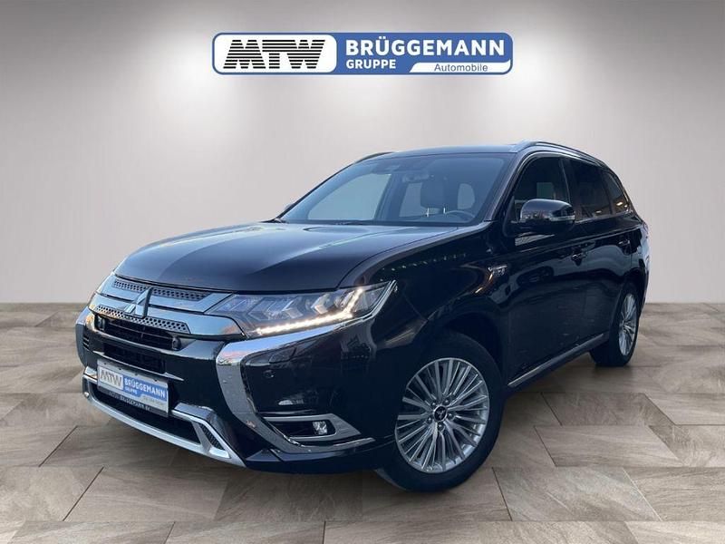 M) (schwarz Gebraucht 2021 Mitsubishi Outlander P-HEV Top SUV | 25.470 € (Fairer Preis) - Bild 1/4