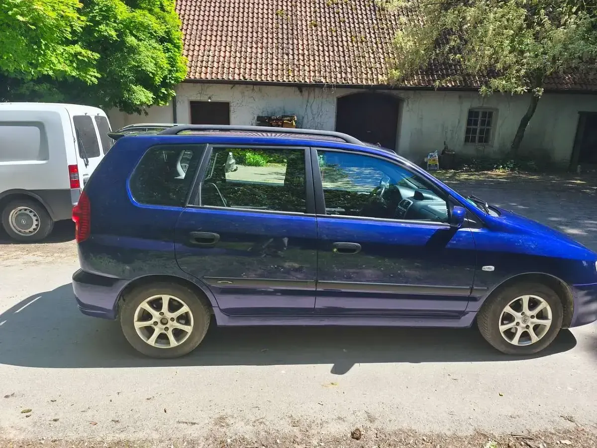 Begagnad Mitsubishi Space Star Motion 98 HK (72 kW) 2004 Blå Minibuss