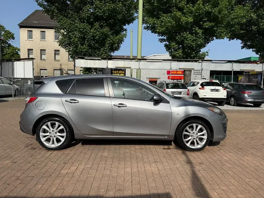 Używany Mazda 3 Exclusive-Line 116 KM (85 kW) 2011 Szary Sedan/Limuzyna