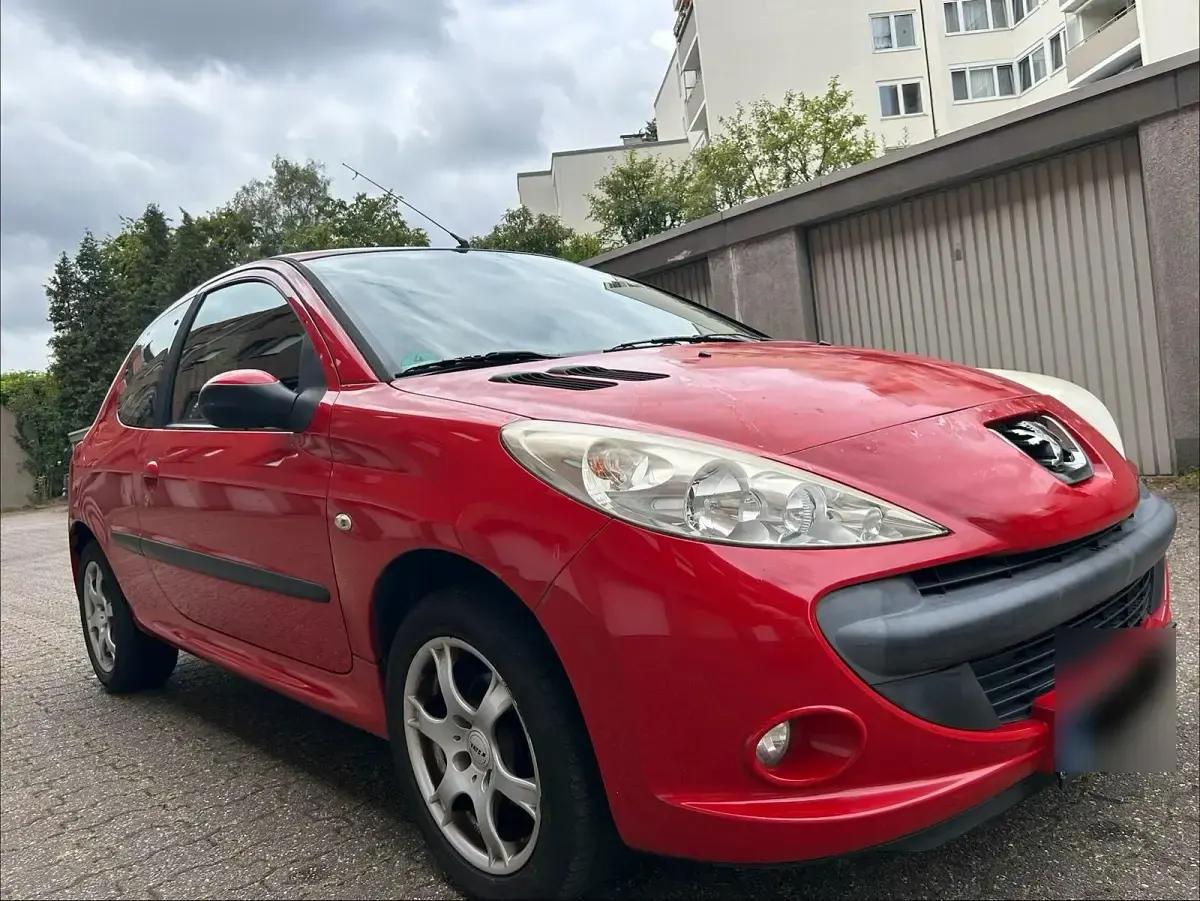 Gebraucht Peugeot 206+ 60 PS (44 kW) 2009 Rot Kleinwagen