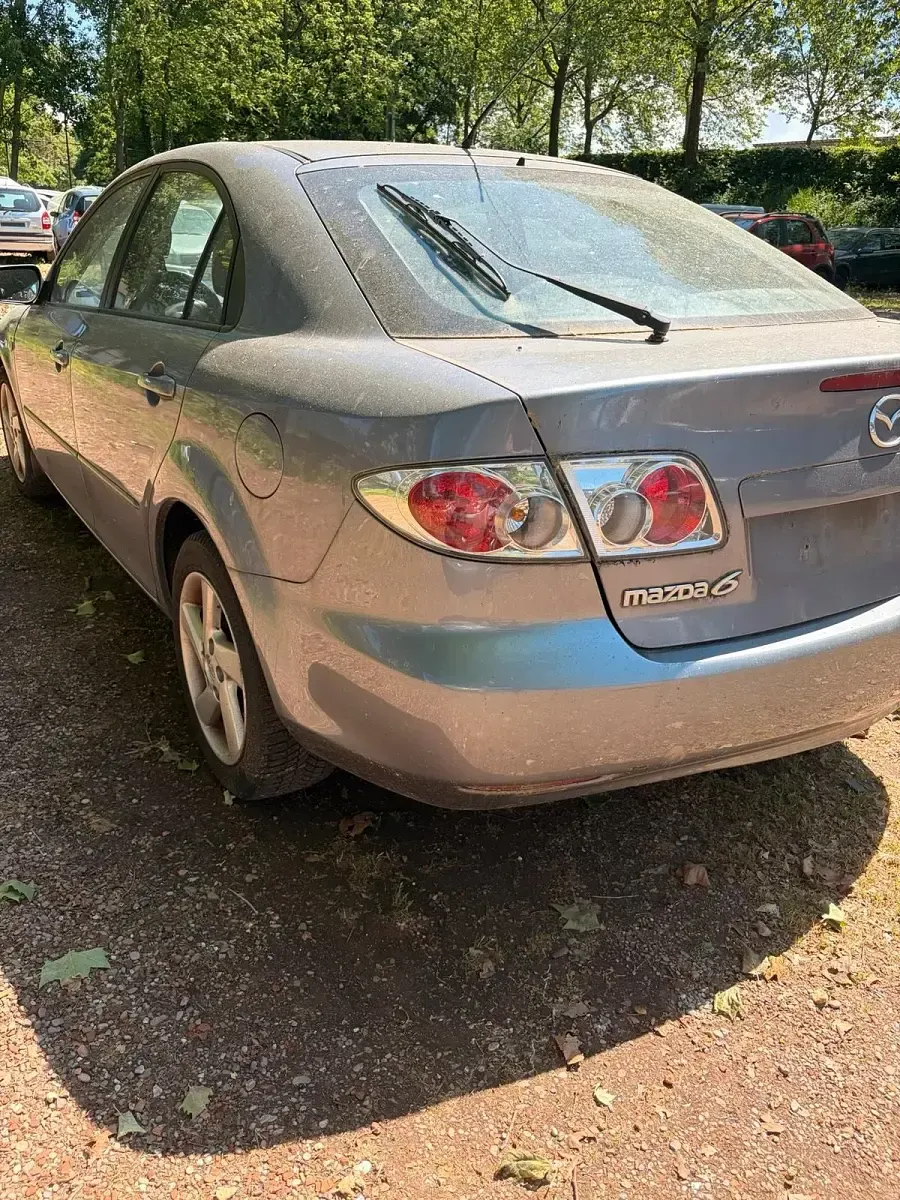 Używany Mazda 6 141 KM (103 kW) 2004 Szary Sedan/Limuzyna