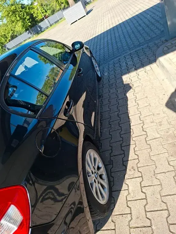 Gebraucht BMW 116 116 PS (85 kW) 2006 Schwarz Kleinwagen