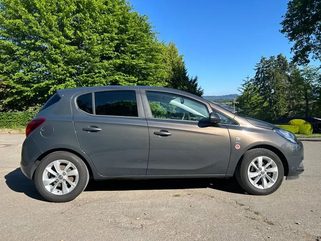 Używany Opel Corsa drive 90 KM (66 kW) 2016 Szary Hatchback