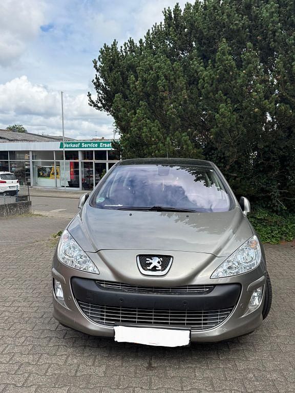 Braun Gebraucht 2010 Peugeot 308 Platinum Kombi | 7.950 € - Bild 1/4