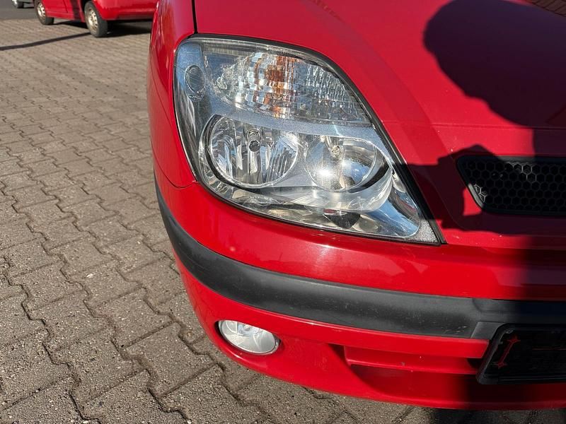Używany Renault Scénic 107 KM (78 kW) 2000 Czerwony Minivan