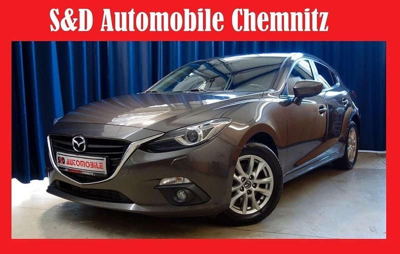 Obsidiangrau metallic Gebraucht 2014 Mazda 3 Center-Line Kleinwagen | 6.299 € (Etwas zu teuer) - Bild 1/3