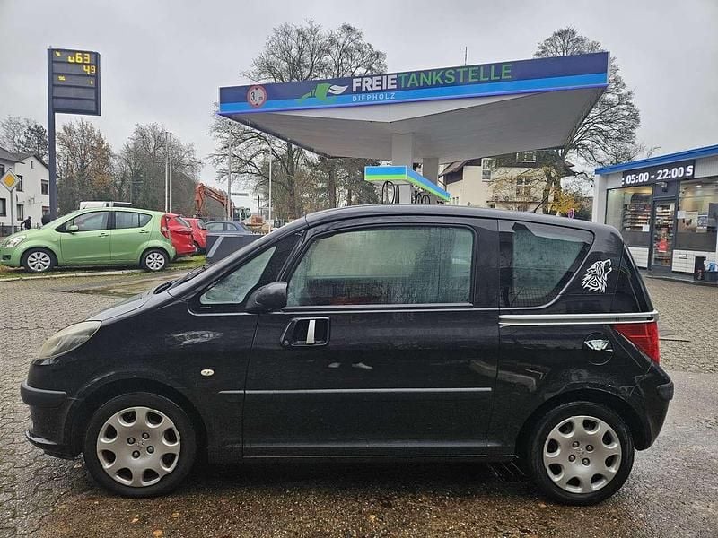 Gebraucht Peugeot 1007 Premium 73 PS (53 kW) 2007 Farbe schwarz Van / Kleinbus