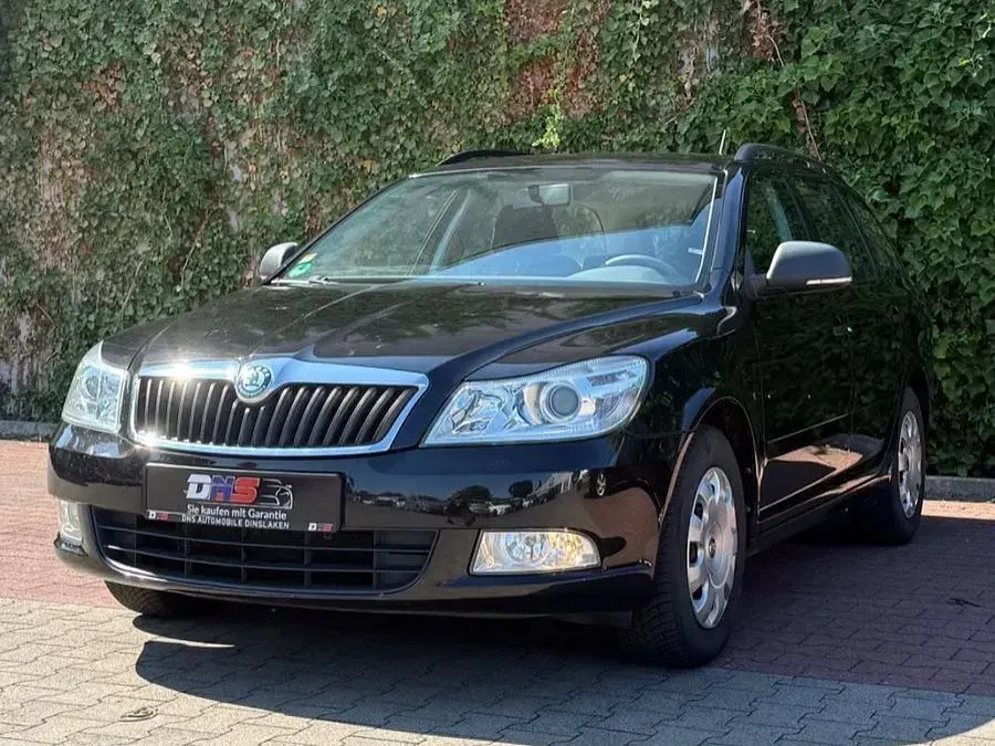 Gebraucht Skoda Octavia Fun 105 PS (77 kW) 2013 Schwarzmagic perleffekt Kombi