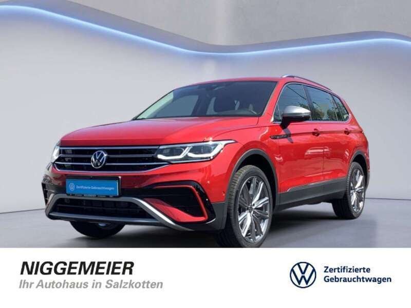 Kings red metallic Gebraucht 2024 VW Tiguan Allspace Elegance SUV | 47.790 € (Fairer Preis) - Bild 1/4