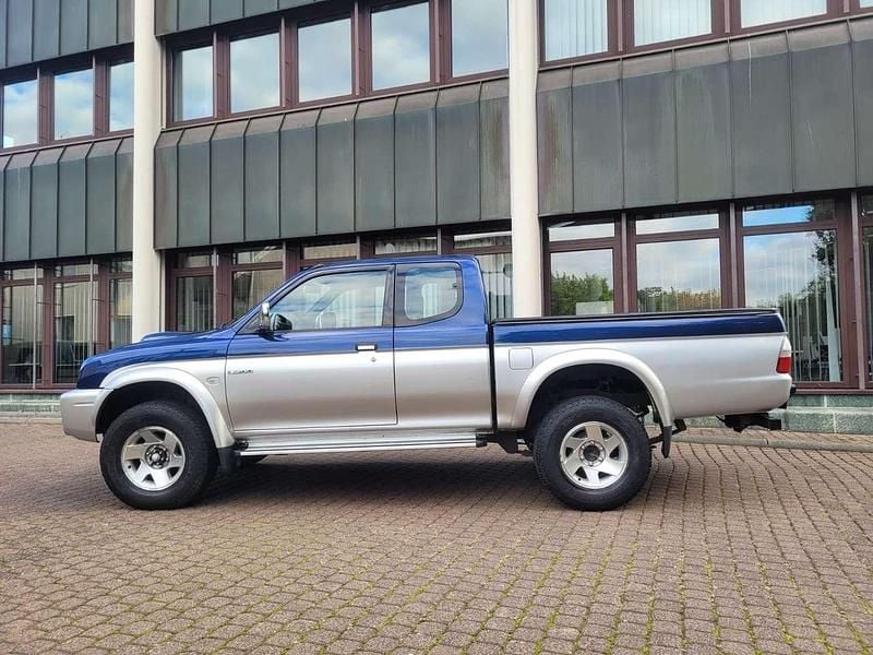 Blau/silber Gebraucht 2003 Mitsubishi L200 Abholung | 13.900 € (Teuer) - Bild 1/4