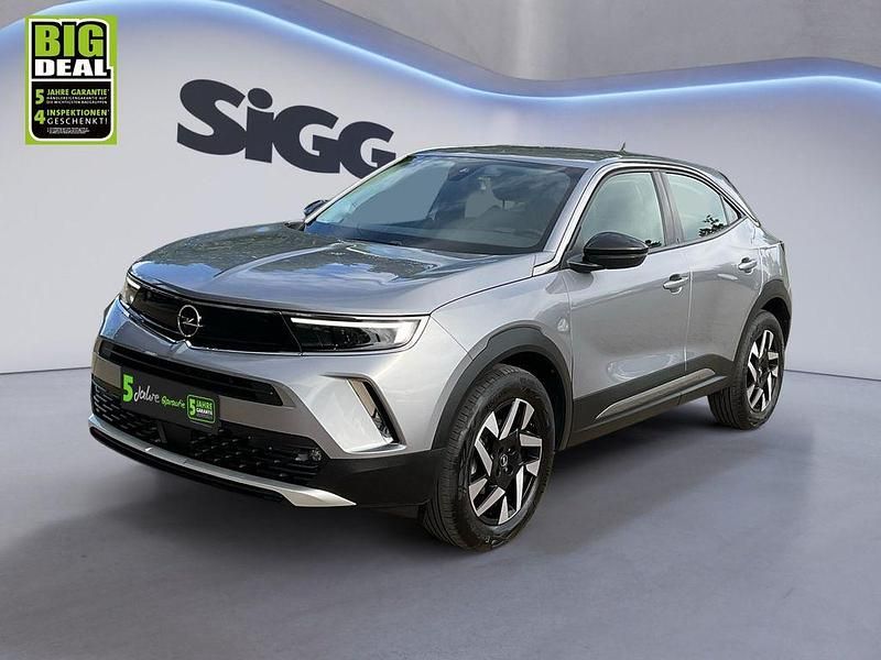 Gebraucht Opel Mokka Elegance 101 PS (74 kW) 2022 Kontrast grau/quarz silber SUV