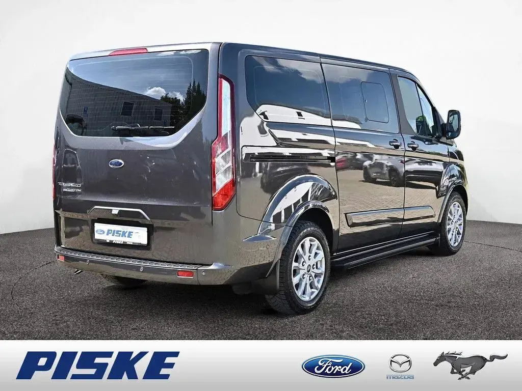 Gebraucht Ford Tourneo Titanium 170 PS (125 kW) 2023 Magnetic grau Van / Kleinbus