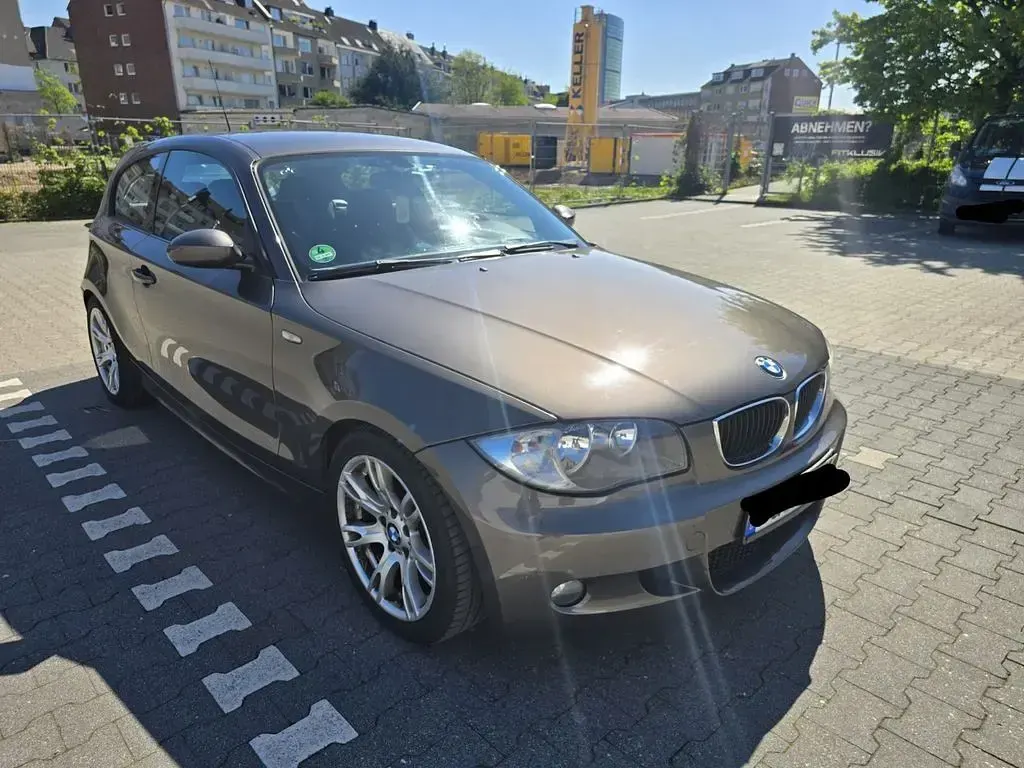 Używany BMW 116 Performance 122 KM (89 kW) 2009 Brązowy Hatchback
