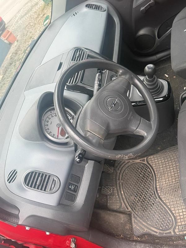 Gebraucht Opel Corsa 60 PS (44 kW) 2010 Rot Kleinwagen