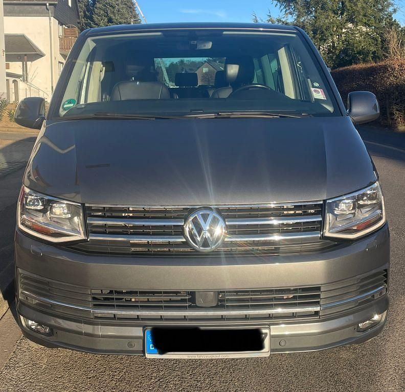 Grau Gebraucht 2015 VW T6 Generation Six Van | 28.899 € (Fairer Preis) - Bild 1/4
