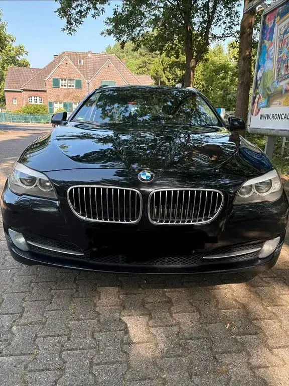 Gebraucht BMW 520 184 PS (135 kW) 2012 Schwarz Kombi