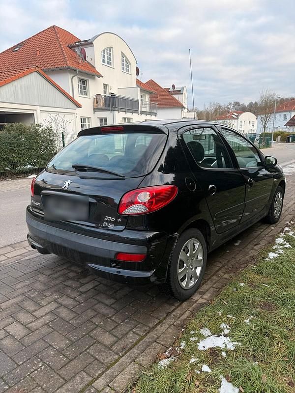 Gebraucht Peugeot 206+ 75 PS (55 kW) 2011 Schwarz Kleinwagen