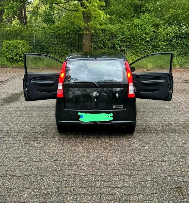 Schwarz Gebraucht 2006 Daihatsu Cuore Kleinwagen | 2.200 € (Fairer Preis) - Bild 1/4