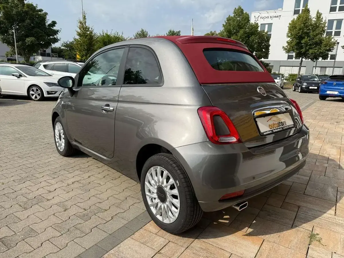 Gebraucht Fiat 500C Basis 69 PS (50 kW) 2023 Pompei grau / verdeck rot Cabrio
