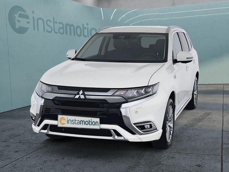Weiß Gebraucht 2021 Mitsubishi Outlander P-HEV SUV | 23.699 € (Etwas zu teuer) - Bild 1/4