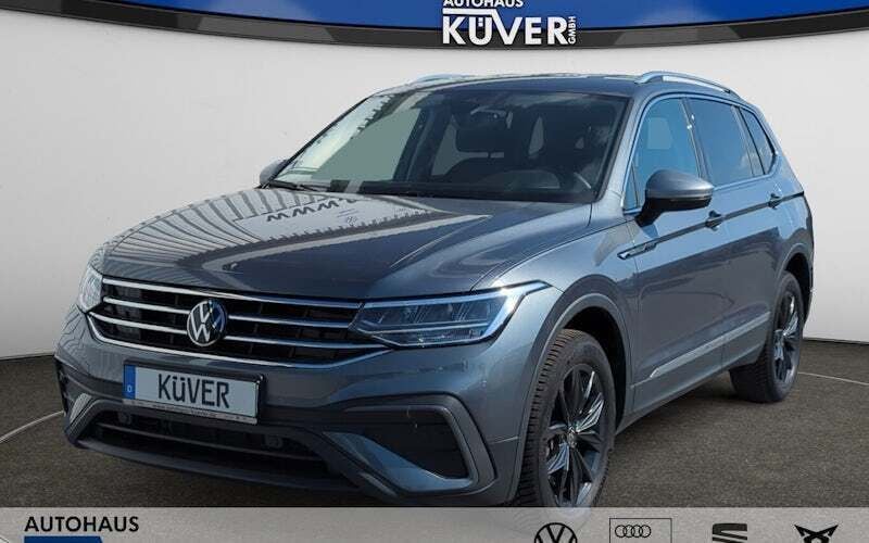 Grau Gebraucht 2024 VW Tiguan Allspace Move SUV | 34.550 € (Superpreis) - Bild 1/4