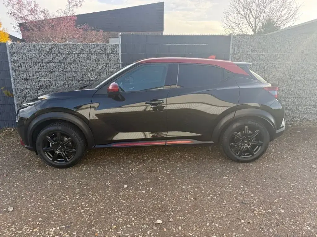 Gebraucht Nissan Juke 117 PS (86 kW) 2020 Black fuji sunset red (metallic) SUV