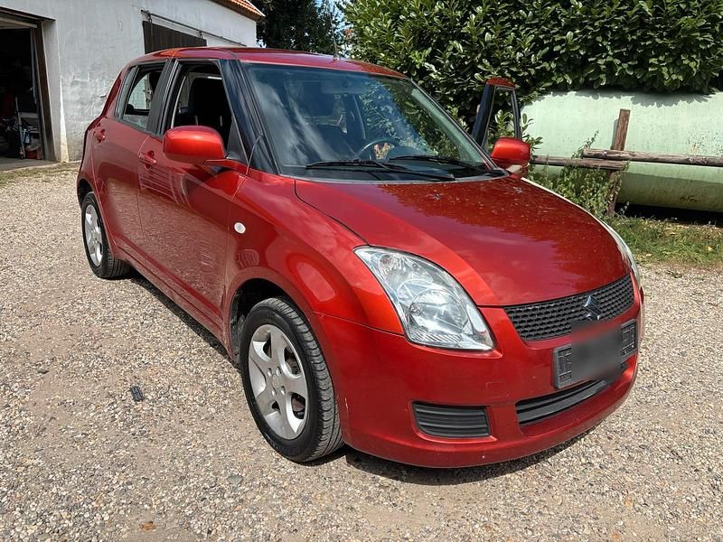 Rot Gebraucht 2009 Suzuki Swift Kleinwagen | 3.000 € (Fairer Preis) - Bild 1/4