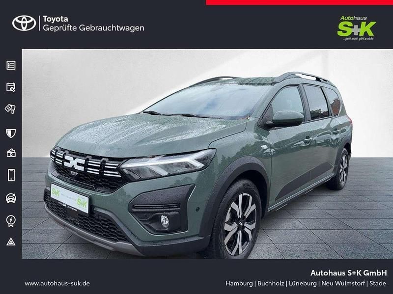 Grün Neu 2024 Dacia Jogger Expression Limousine | 26.890 € (Fairer Preis) - Bild 1/4