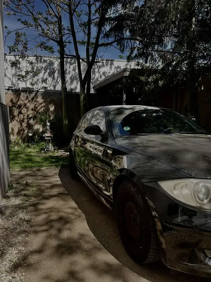 Second-hand BMW 116 122 CP (89 kW) 2007 Negru Hatchback
