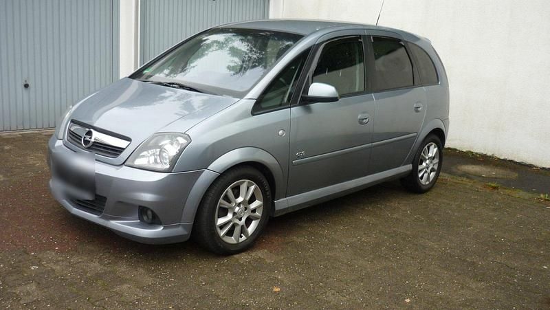 Grau Gebraucht 2010 Opel Meriva OPC Van / Kleinbus | 3.500 € (Fairer Preis) - Bild 1/4