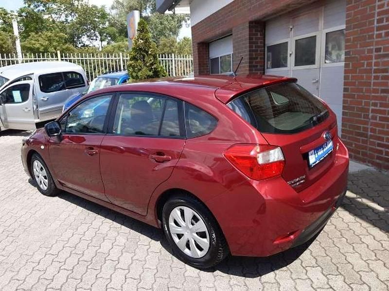 Gebraucht Subaru Impreza 114 PS (83 kW) 2013 Dunkelrot metallic Limousine