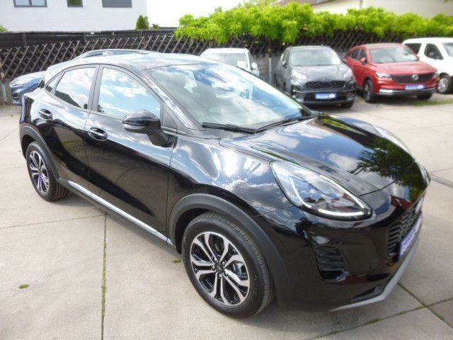 Obsidianschwarz metallic Gebraucht 2024 Ford Puma Titanium SUV | 21.999 € (Superpreis) - Bild 1/4