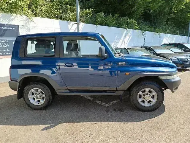 Gebraucht SsangYong Korando 209 PS (153 kW) 1997 Blue metallic SUV