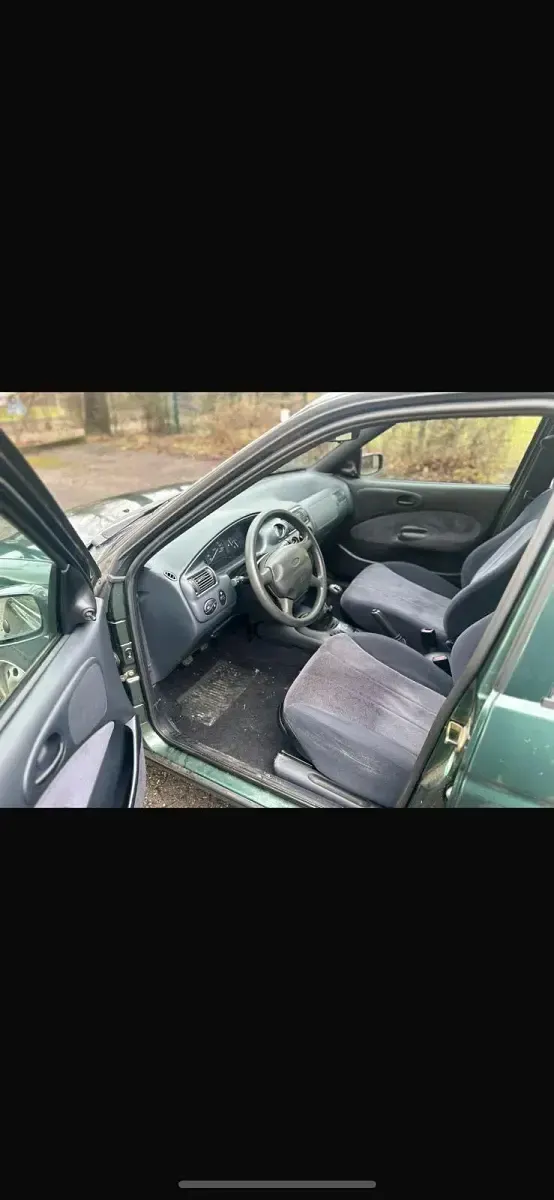Gebraucht Ford Escort 101 PS (74 kW) 1999 Grün Limousine