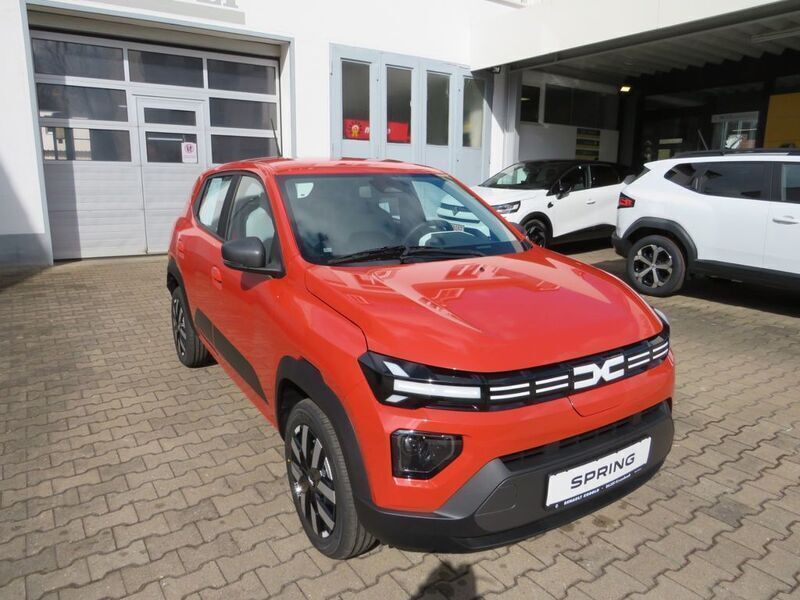 Rot Neu 2024 Dacia Spring Expression Kleinwagen | 16.975 € (Guter Preis) - Bild 1/4