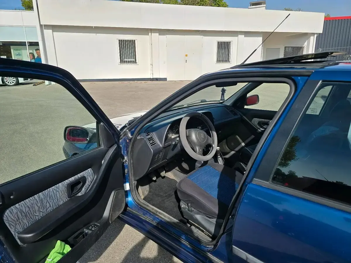 Gebraucht Peugeot 306 75 PS (55 kW) 1996 Blau Kleinwagen