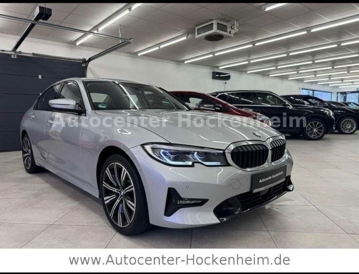 Silber Gebraucht 2020 BMW 330e M Sport Limousine | 27.999 € - Bild 1/4