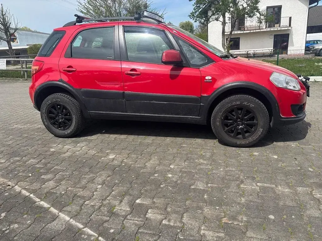 Gebraucht Suzuki SX4 Comfort 135 PS (99 kW) 2010 Rot Limousine