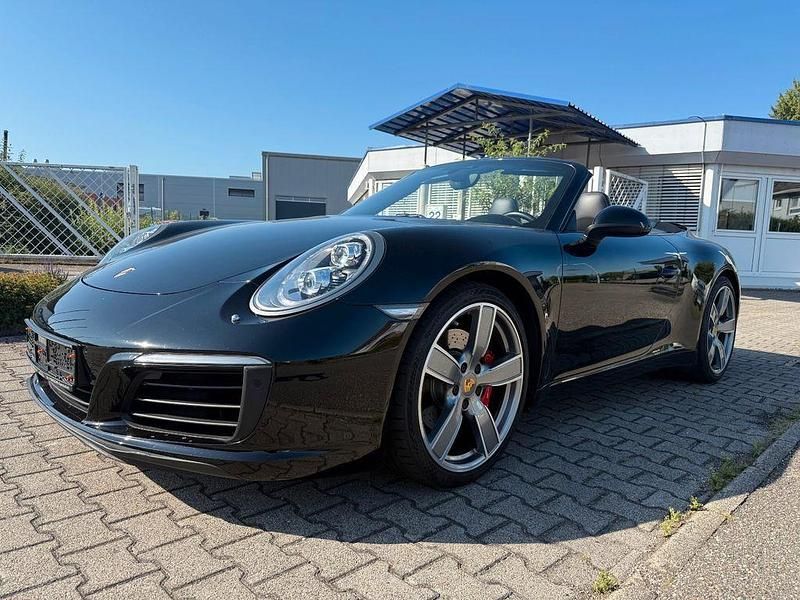 Tiefschwarz Gebraucht 2016 Porsche 911 Carrera S Cabriolet Cabrio | 89.000 € (Fairer Preis) - Bild 1/4