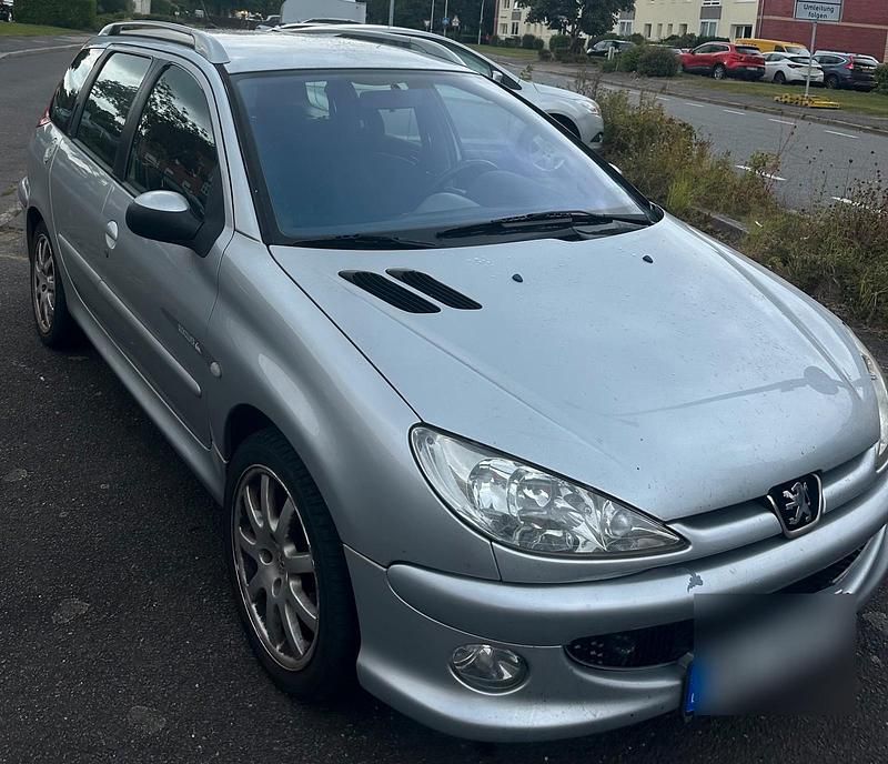 Silber Gebraucht 2003 Peugeot 206 Kombi | 2.100 € - Bild 1/4