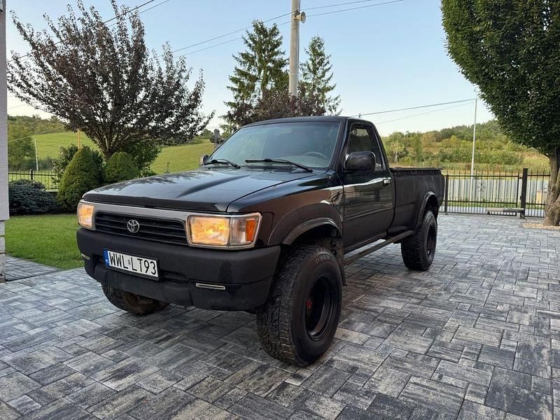 Schwarz Gebraucht 1994 Toyota HiLux Abholung | 9.900 € - Bild 1/4