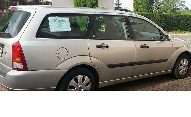 Gebraucht Ford Focus Ghia 116 PS (85 kW) 1999 Silber metallic Kombi