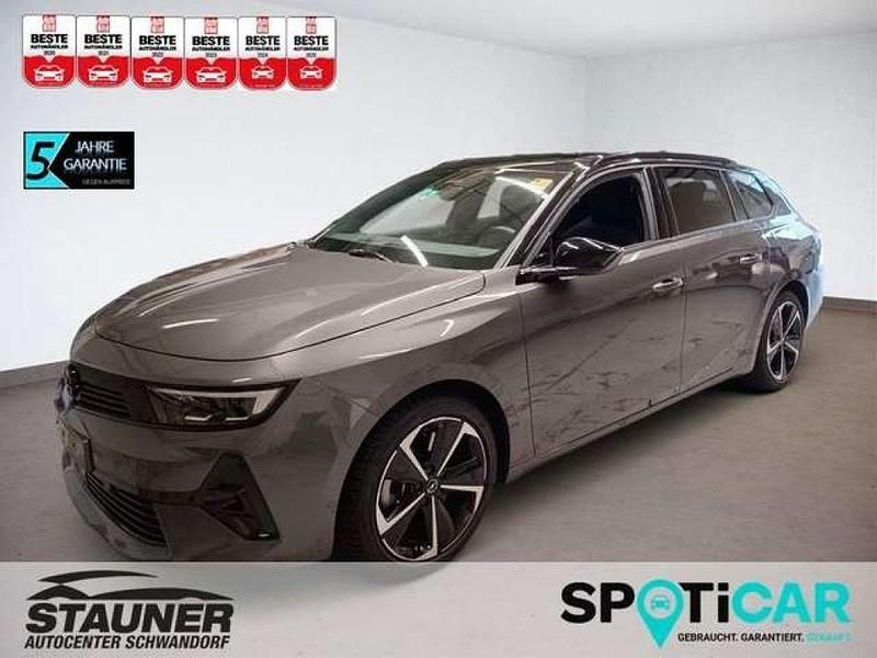 Vulkan grau/dach schwarz (metallic) Gebraucht 2024 Opel Astra Kombi | 26.900 € (Guter Preis) - Bild 1/4
