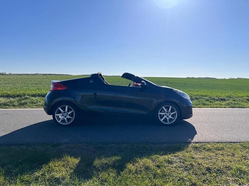 Second-hand Renault Wind Dynamique 101 CP (74 kW) 2010 Negru Cabrio