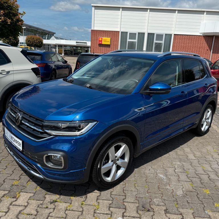 Reef blue metallic Gebraucht 2021 VW T-Cross Style SUV | 22.590 € (Fairer Preis) - Bild 1/4