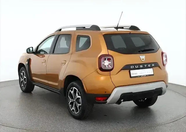 Używany Dacia Duster Prestige 125 KM (91 kW) 2018 Pomarańczowy SUV