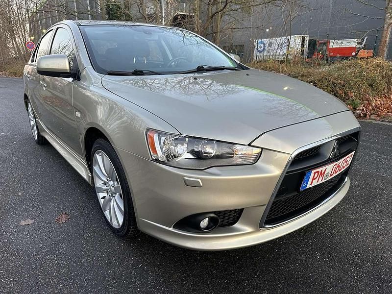 Bronze Gebraucht 2011 Mitsubishi Lancer Limousine | 6.900 € (Fairer Preis) - Bild 1/4
