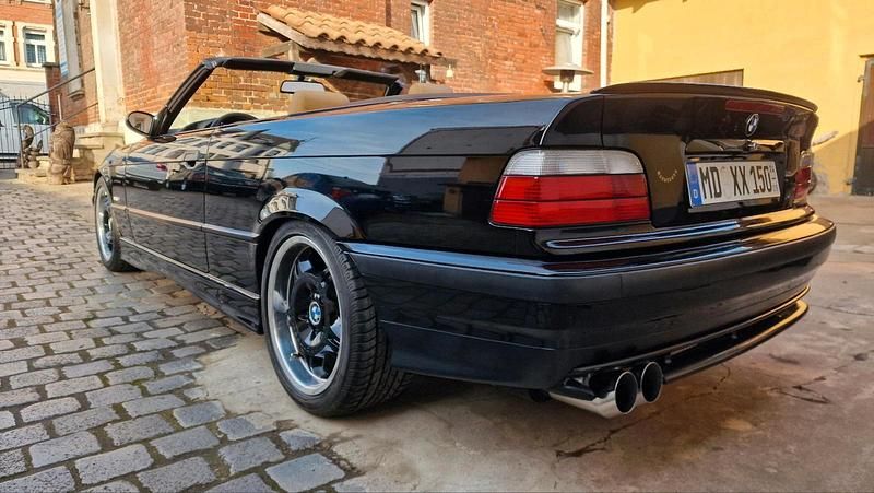 Gebraucht BMW 320 Cabriolet 150 PS (110 kW) 1997 Schwarz Cabrio