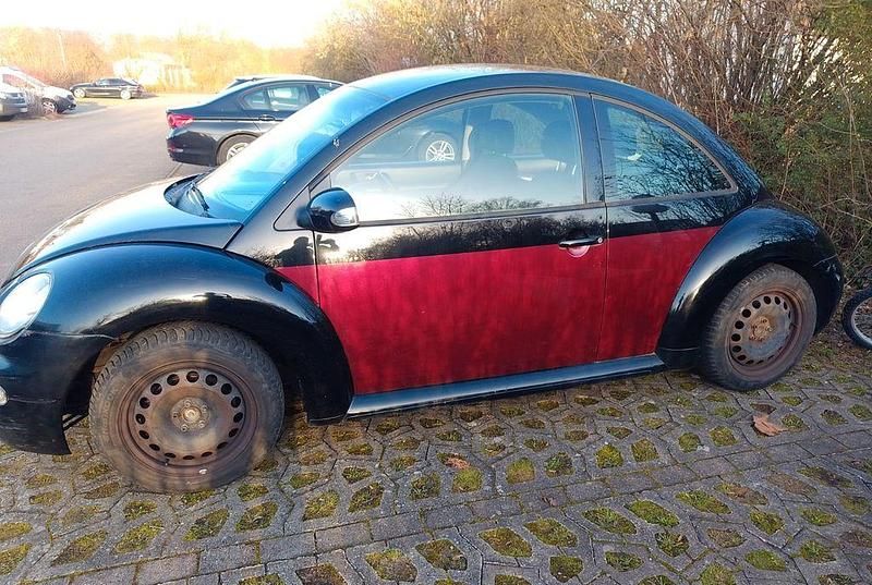 Second-hand VW Beetle 106 CP (77 kW) 2004 Negru Hatchback